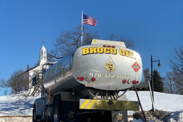 Broco Energy heating oil truck with USA flag in the background