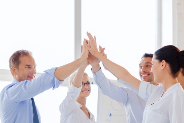 business team giving high five
