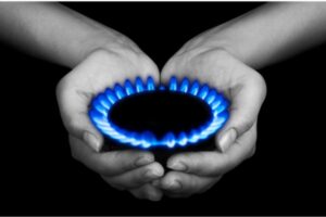 propane fire held by a hand