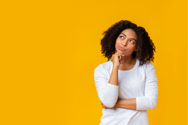 image of a woman thinking depicting how to choose a heating oil company