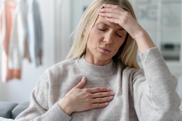 woman feeling sick due to propane gas leak