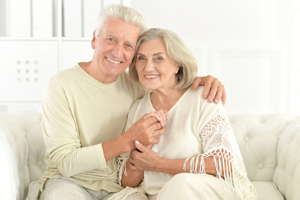 happy mature couple depicting humidity control and improve indoor air quality happy mature couple depicting humidity control and improve indoor air quality