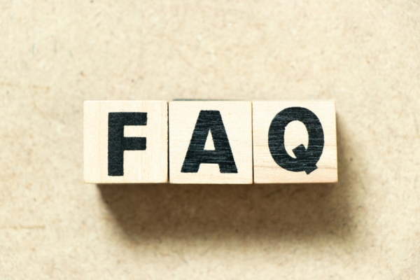 FAQ spelled using wooden letter cubes depicting questions about home heating