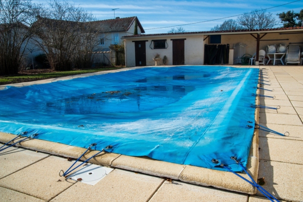 pool protected by pool covering during winter months