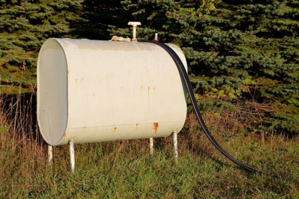 old gasoline tank installed outside the house