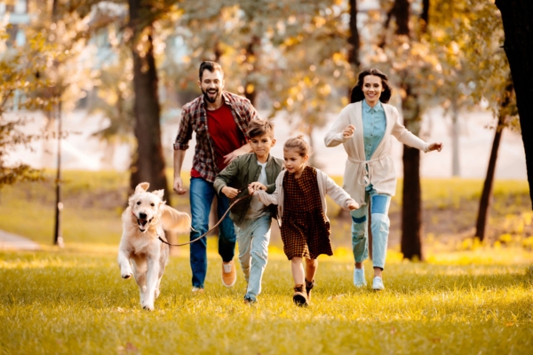 family of 4 with a dog enjoying the outdoors depicting propane's clean burn