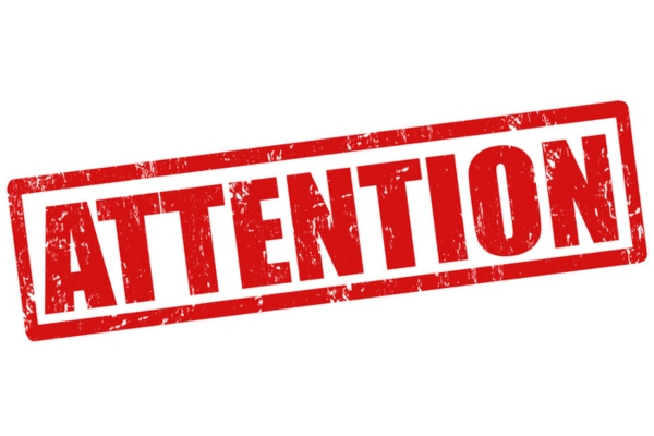 Attention word on red stamp