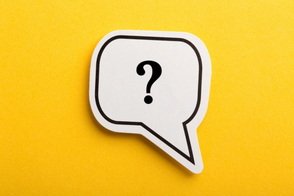 question mark on a speech bubble cutout depicting Heating Oil Tank Sludge FAQs