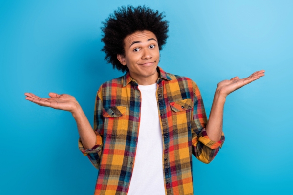 man shrugging with both hands raised on each side depicting Why Heating Oil Has Remained a Trusted Heating Solution