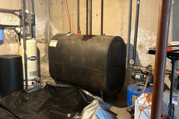 old home heating oil tank in the basement